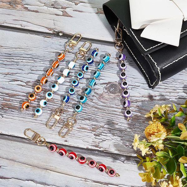 WADORN 6 Colors Evil Eye Tassel Keychain, 14.2cm Round Tassel Pendant Car Keys Holder Beaded Hanging Decorative Chain with Alloy Clasps for Key Purse Handbag Phone Case Jewelry Accessories 3