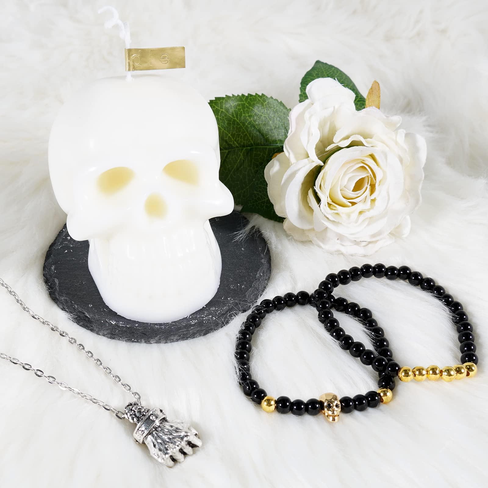 Soulnioi White Skull Candle Scented Soy Wax Candle Burning Time(10-15H), Black Stone Coaster for Candle, 2pcs Obsidian Beaded Bracelets Skull Charm, Antique Silver Fist-Shaped Necklace with Chain 1